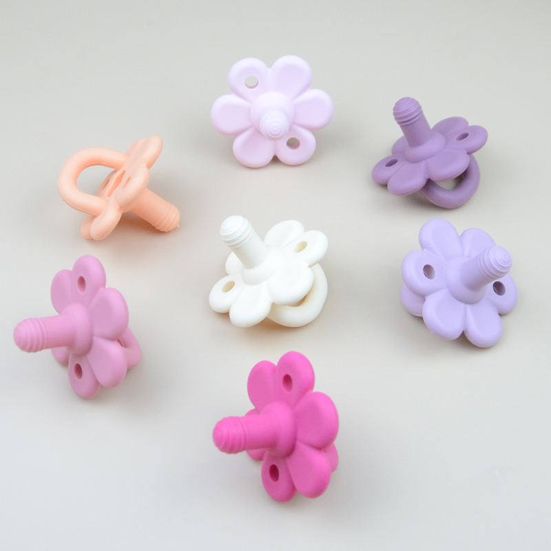Why is the surface of silicone rubber products dry?baby pacifier bibs Factory